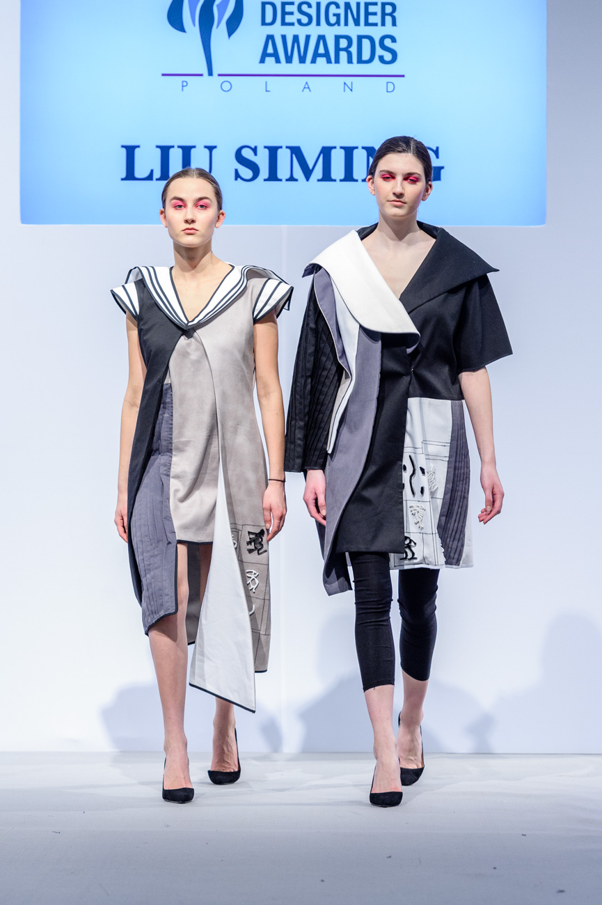 刘思明同学设计的作品“清溪”走T型台